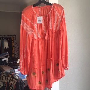 Wild Horses Embroidered long sleeve mini dress.